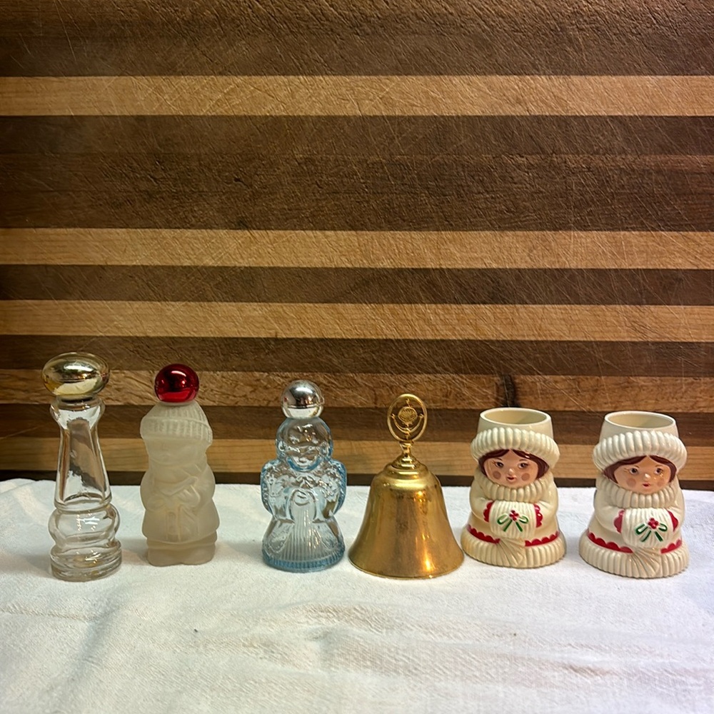 Avon, empty bottles, bell and candleholders